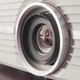 You focus the lens by manipulating a ring much as one would do on a camera.